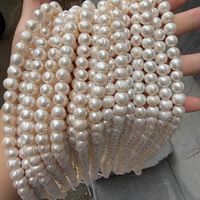 Perles d'eau douce presque rondes de 9-10 mm avec de grands trous d'une ouverture de 2,5 mm, naturelles, non nucléées, d'environ 36 cm de long avec 42 perles