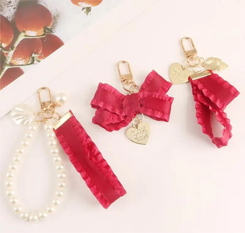 Roter Stoff Perle Metall Schlüssel bund Kreative Strick bogen Shell Hochzeits geschenke für Gäste Kopfhörer Set Rucksack <span class=keywords><strong>Anhänger</strong></span>