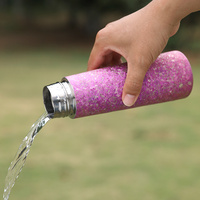 Bouteille d'eau isolée en titane Tasse à vide à double paroi Bouteille de sport légère et étanche