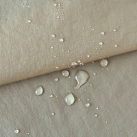 Tissu en nylon-polyester de haute qualité à pois perlés 50 GSM Convient pour les coupe-vent légers et les doudounes