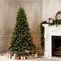 Sapin de Noël artificiel floqué pré-éclairé de qualité supérieure avec un mélange de PE et de PVC pour une réalisme accrue