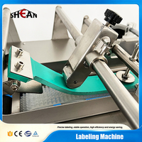 Machine d'étiquetage automatique de bureau pour surfaces planes, boîtes plates, cartes, sacs, livres, bouteilles, autocollants adhésifs
