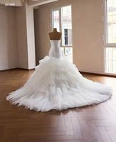 Robe de mariée sirène élégante en tulle de haute qualité, col rond, sans manches, avec dentelle et plis lourds