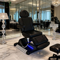 Table de massage électrique pliable de luxe noire à 3 moteurs, en PU, réglable, avec repose-pieds, accoudoirs et base LED