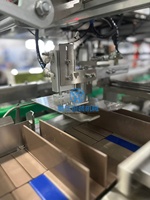 Machine d'emballage automatique de haute qualité YH pour cartonner les masques faciaux en sachet