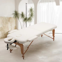 Luxuriöse Weiße Leder-Massageliege Verstellbare Klappbare Massageliege Tragbare Schönheitssalon Gesichts-Spa Massageliege