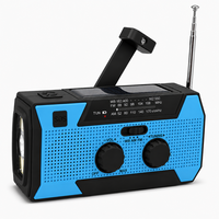 Radio d'urgence portable NOAA solaire à manivelle avec chargeur de téléphone 5000 mAh, lampe torche LED et alarme SOS pour situations de catastrophe et tempêtes