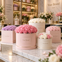 Boîte à fleurs ronde multi-tailles avec bordure dorée, logo personnalisé, en carton rigide pour présentation florale