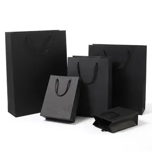 Carton Stock Cadeau Vêtements Shopping Sac en papier Vente en gros Personnalisé Imprimé Noir Personnalisé OEM Impression Offset Papier de Qualité Alimentaire