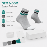 Chaussettes de sport montantes grises respirantes en coton/fibre de bambou sans coutures pour le printemps