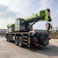 Grue de camion hydraulique d'occasion de 100 tonnes, moteur 430 CV, flèche à 6 sections de 60,5 m, grue robuste 8x4 pour installation en usine