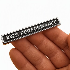 Emblema Personalizzato XGS PERFORMANCE in ABS con Base Nera e Lettere Cromate, Badge 3D Autoadesivo Impermeabile per Auto - Product Image 1