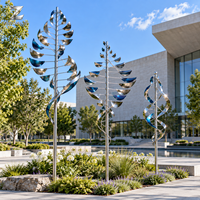 Sculpture éolienne cinétique en acier inoxydable finition brossée, art de jardin dynamique personnalisé pour parcs, centres de villégiature, places publiques et centres d'art paysager