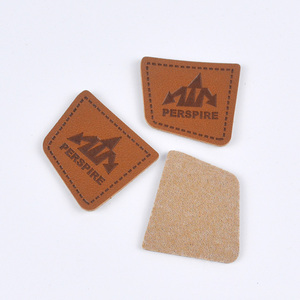 Debossed Black <strong>Jeans</strong> High Quality PU <strong>Label</strong> New Fashion Style Logo Patch <strong>China</strong> Soft Skin Iron Rubber Material Printed Technique - Product Image 1