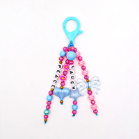 Porte-clés mignon en acrylique couleur bonbon style dessin animé pour femme, avec mousqueton, en argile polymère arc-en-ciel, motifs étoile, œil de diable, visage souriant, papillon