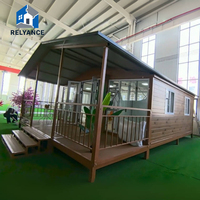 Relyance Module Préfabriqué de Luxe 20 pieds, Type Boîte Extensible à Double Aile, avec Terrasse, 2-3 Chambres, Système Électrique Complet, Maison Modulaire Mobile