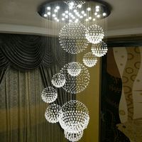 Lustre en cristal moderne K9 grand escalier de luxe suspendu E14 LED pour la décoration du hall d'hôtel Installation de projet en acier