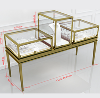 Vitrine de présentation de bijoux haut de gamme Sundo avec éclairage LED, matériaux écologiques, dos en verre/miroir pour les magasins de détail