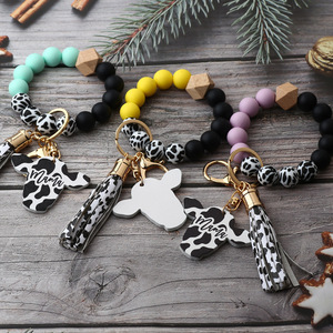 Nouveau bracelet en perles <span class=keywords><strong>de</strong></span> silicone pour hommes porte-clés <span class=keywords><strong>de</strong></span> style occidental tête <span class=keywords><strong>de</strong></span> vache à <span class=keywords><strong>copeaux</strong></span> <span class=keywords><strong>de</strong></span> <span class=keywords><strong>bois</strong></span> MAMA - Product Image 5