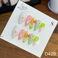 Manucure d'amande florale sculptée en trois dimensions de longueur moyenne européenne et américaine, ongles portables amovibles faits à la main.