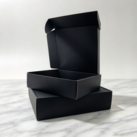 Boîte d'expédition en carton ondulé noir mat avec logo personnalisé pour l'emballage postal