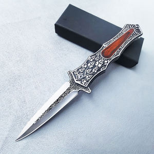 Cuchillo de caza de acero inoxidable con punta curva, mango de madera y diseño de hoja grabada para uso en exteriores - Product Image 3