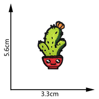 Broderie en pot de plantes mignonnes sur patchs en pot d'herbe de cactus