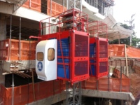 Monte-charge de chantier SC150 2x1500kg, 34m/min, transmission par engrenages, hauteur de levage 200m, pour passagers et matériaux