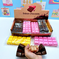 Jouet à presser en chocolat tricolore à récupération lente X - Jouet anti-stress le plus vendu - Ensemble de 12 pièces en boîte