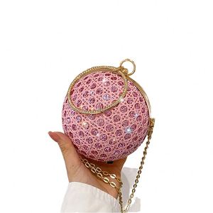 Bolso de mano con cadena para mujer con asa esférica y diseño de mármol - Product Image 2
