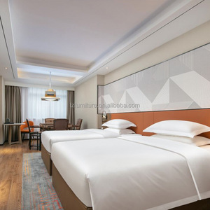 Meubles de chambre d'hôtel fournis directement par l'usine, lit king size avec cadre en bois, matelas et ensemble de literie en coton. - Product Image 4