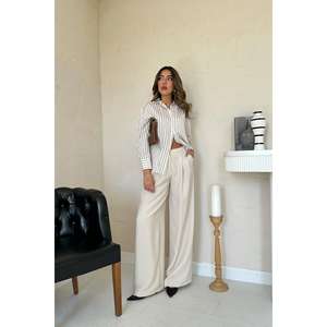 เสื้อเชิ้ตผู้หญิงสีเบจลายทางเรียบง่าย กระดุมผ่าหน้า ผ้าป๊อปลิน สวมใส่สบายทุกวัน แขนยาว ทรงหลวม แฟชั่นทันสมัย - Product Image 4