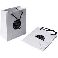 Sac de shopping et d'emballage cadeau en papier recyclable personnalisé avec votre propre logo, avec poignée découpée pour vêtements, pour boutique
