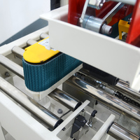 Machine de scellage de cartons électrique entièrement automatique GURKI - Haute efficacité Longue durée de vie Applications pour les boissons et les vêtements