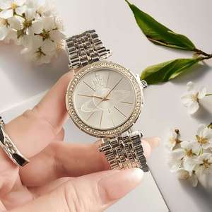 Reloj de cuarzo de acero inoxidable para mujer, caja redonda, pantalla analógica, esfera con números romanos, cierre plegable, reloj elegante de moda - Product Image 6