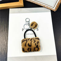Porte-clés mini sac à main en fausse fourrure imprimé léopard mignon, pompon en peluche, breloque de sac, fermoir mousqueton en métal, pour femme, décoration de sac, cadeau
