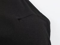 Combinaison chic sans manches pour femme, nouvelle collection 2026, style décontracté, col en V, ornée d'œillets, tendance rétro.