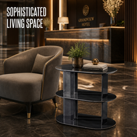 Ensemble de tables basses minimalistes à cadre métallique rond avec plateau en pierre frittée aspect marbre pour salon, chambre, hôtel, projet commercial