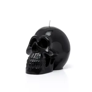 Bougie de décoration de maison Halloween créative personnalisée bougie non parfumée en forme de tête de mort blanche et noire à la cire de paraffine