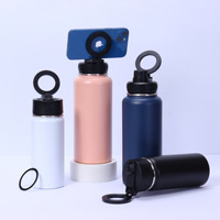 Grande bouteille d'eau magnétique de 32oz avec support de téléphone, gobelet thermique en acier inoxydable avec mousqueton pour le camping, le cyclisme et le bureau