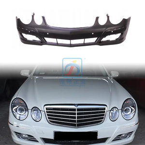 Pare-chocs avant en fibre de carbone autoclavée pour <span class=keywords><strong>Mercedes</strong></span> Benz W211 <span class=keywords><strong>Classe</strong></span> E, surface brillante neuve, découpes pour feux antibrouillard, installation par visser. - Product Image 1