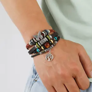 Joyería de mano profesional al por mayor aleación mariposa mundo árbol accesorios son en su mayoría pulseras de cuero con cuentas