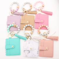 Porte-cartes bracelet en perles de silicone 2026, portefeuille fin en PU imprimé léopard, porte-clés, pochette à cartes, porte-monnaie avec pompon