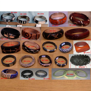 Vente en gros BS INTERNATIONAL – Nouveauté : Bijoux de mode féminins en résine d'ivoire, style occidental, forme de boule, design personnalisé, haut de gamme, pour mariages et occasions religieuses. - Product Image 1