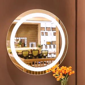 Venta al por mayor fabricante redonda de lujo moderno de lujo Anti-niebla LED retroiluminada pelo salón iluminado con luz de baño espejo de maquillaje