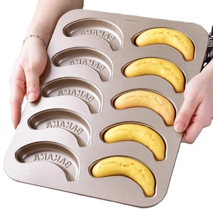 พิมพ์เค้กรูป<span class=keywords><strong>กล้วย</strong></span> 10 หลุม ทำจากอะลูมิเนียมสีทอง, พิมพ์อบขนมเหล็กกล้าคาร์บอน, พิมพ์รูปทรงกล้วยสุดสร้างสรรค์ - Product Image 1