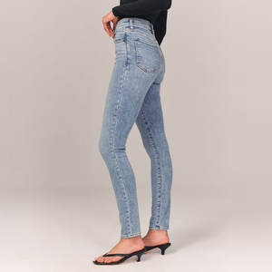 Pantalones ajustados de cintura alta de color liso al por mayor, pantalones vaqueros elásticos personalizados para mujer, pantalones vaqueros elásticos de cintura alta y ajuste relajado - Product Image 3