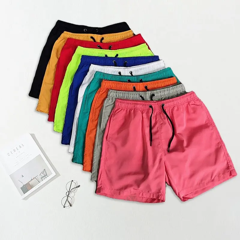 Calça de verão hip hop estampada com logotipo 3D personalizado, shorts de praia soltos para homens, shorts de bolso com padrão de cor pura por atacado