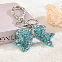 Nouveaux porte-clés en cristal scintillant avec nœud, porte-clés à pompon, accessoires pour sac, pendentif de voiture, porte-clés en forme de nœud, breloques pour sac à main