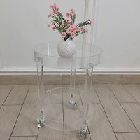 Chariot à roulettes rond en acrylique transparent moderne, plateau de rangement à 2 niveaux, table d'appoint avec roulettes pour la décoration intérieure et la salle à manger à usage hôtelier